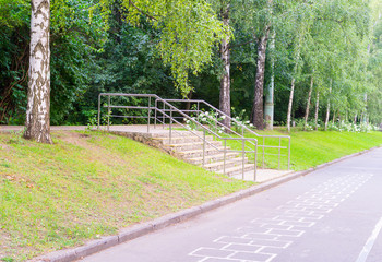 modern staircase in the summer park. background, nature.