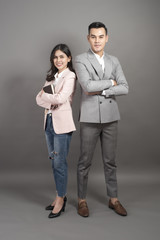 Businessman and businesswoman are smart, portrait in studio
