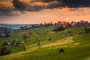Fototapeta na wymiar Sunset over Gliczarow Gorny village near Zakopane, Poland