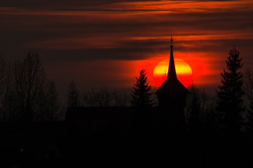 Fototapeta premium Church in Gliczarow Gorny near Zakopane at sunset, Poland