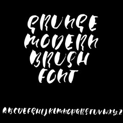 Hand drawn dry brush font. Modern brush lettering. Grunge style alphabet. Vector illustration.