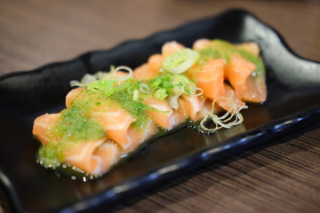 Salmon fish seafood sashimi mix with Thai sauce