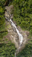 Fototapeta na wymiar Waterfall in The National Vietnam park Bach ma