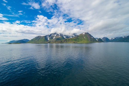 Beautiful mountains on Soroya island in Finnmark county in northern Norway. Wide angle view.