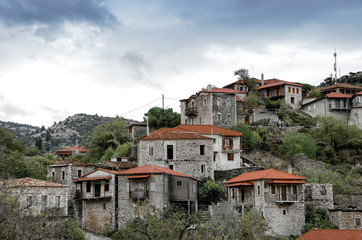 Fototapeta na wymiar Beautiful traditional achitecture on mountain of Mainalo.Stemnitsa village in Greece
