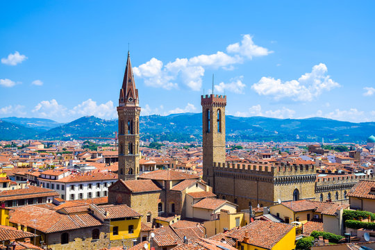 Aerial view over the historical medieval  buildings including the tower of Badia Fiorentina church and Bargello national museum in the old town of  Florence, Italy