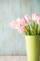 Pink and White Spring Tulips in Green Bucket Vase