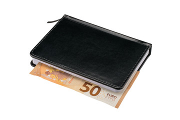Black notebook with euro banknote