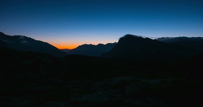 Day to night time lapse from high up on the Alps.