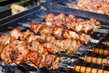 Meat prepared on coals in a barbecue.