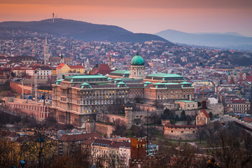 Fototapeta na wymiar Budapest, Hungary - The beautiful Buda Castle at sunset with the Buda Hills at background