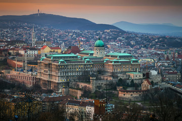 Fototapeta premium Budapest, Hungary - The beautiful Buda Castle at sunset with the Buda Hills at background