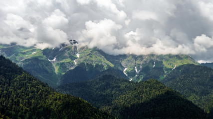 Green mountains and clouds
