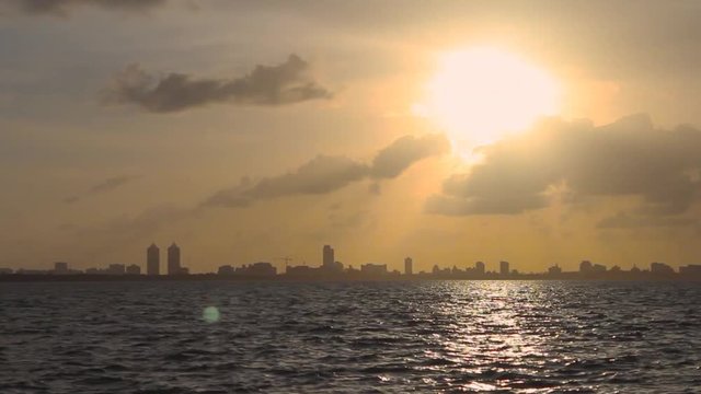 Cityscape Skyline of South Beach Miami, FL with Waters and Sunset