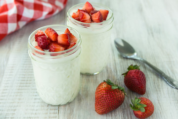 Fresh Yogurt and Strawberries With Spoon