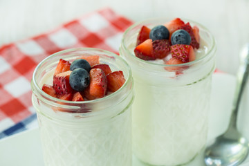 Close Up Yogurt With Strawberries and Blueberries