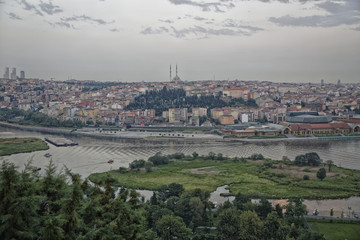 Fototapeta na wymiar Istanbul (Turkey) panoramic daylight view from Pier Loti hill with clouds in sky in background 
