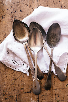 vintage spoons on a linen napkin