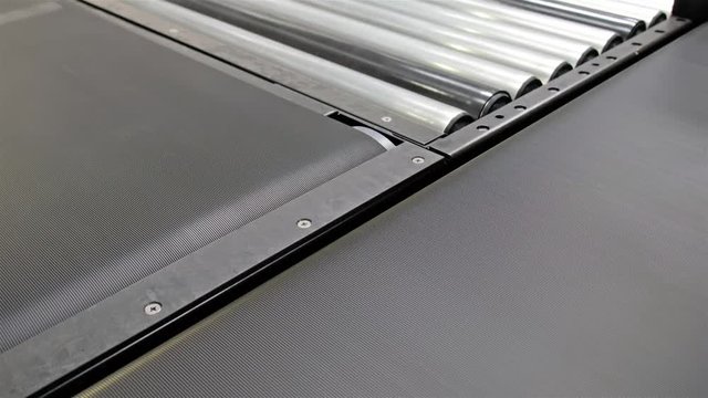 A combination of belt and roller conveyors