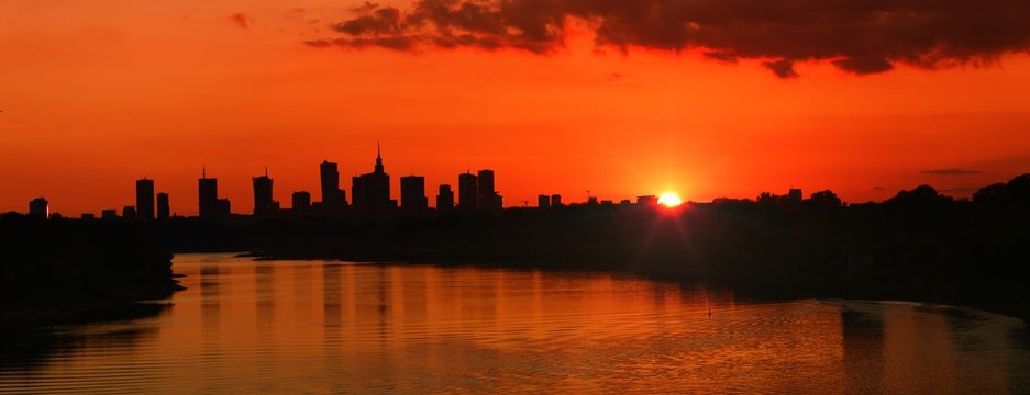 Fototapeta Panorama Warszawy o zachodzie słońca