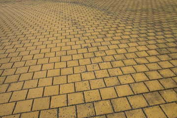 Yellow tile pavement texture pattern