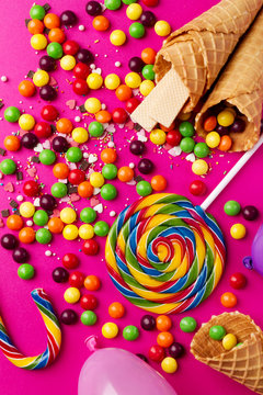 Tasty appetizing Party Accessories on Bright Pink Background