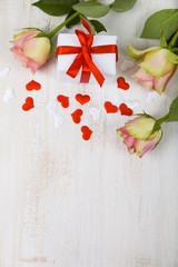 Pink roses,  gift and hearts