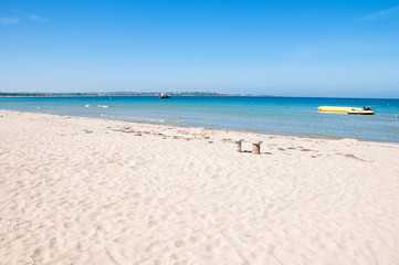 Fototapeta na wymiar Sandy beach and blue sea. Sandy beach Goldfish in Sozopol, Bulgaria.