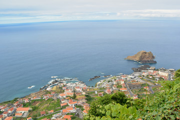 Fototapeta na wymiar Coast town .Natural marine pools and nautic club, porto moniz  ,Madeira