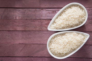 Raw white rice in the bowl - Oryza sativa