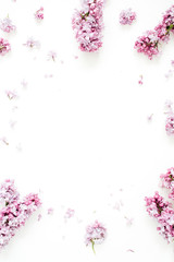 Frame of lilac flowers with space for text on white background. Flat lay, top view