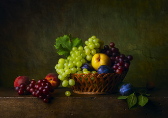 Still life with pears, grapes and plums