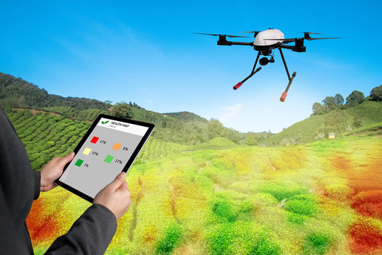 Smart agriculture , farm , precision farming concept. Drone and NIR images application screen used to create field health maps for normalize difference vegetation index in field.