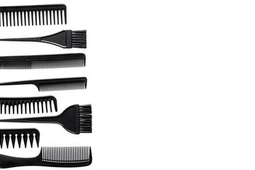 combs and hairdresser tools on white work desk background top view mockup