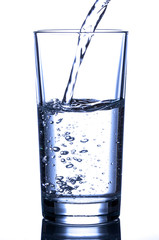 Pouring water into a glass