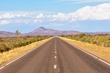Straight road towards the Flinders Ranges, SA, Australia