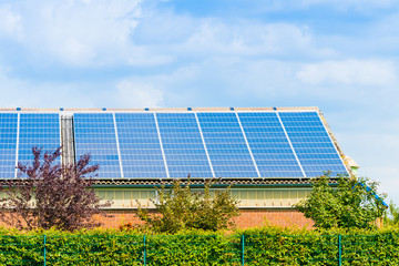 Solar panel on a roof of a house.  alternative energy photovoltaic solar panels