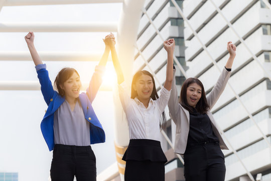 Three business Asian woman celebrating after success they work