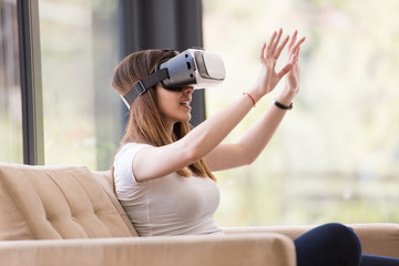 woman using VR-headset glasses of virtual reality