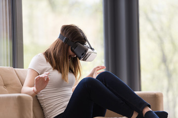 woman using VR-headset glasses of virtual reality