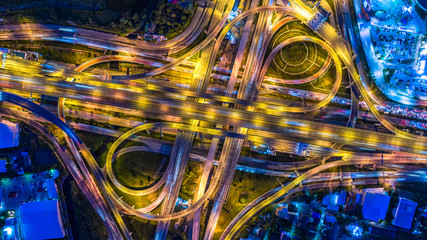Aerial view of a Unique City Roads and Interchanges, Bangkok Expressway top view, Top view over the highway, expressway and motorway at night Aerial view from drone