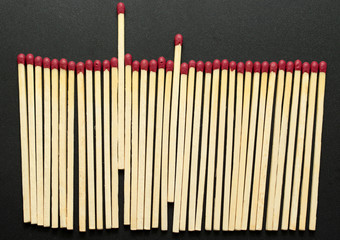 Wooden matches on a black background