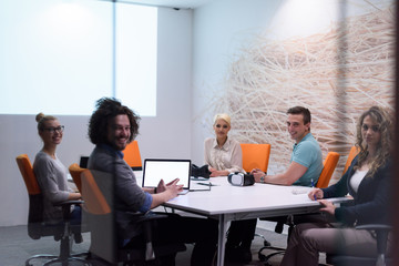 Startup Business Team At A Meeting at modern night office building