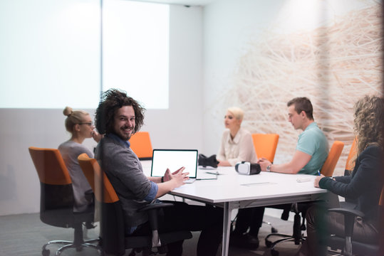 Startup Business Team At A Meeting at modern night office building