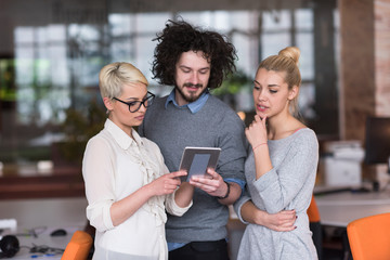 group of Business People Working With Tablet in startup office