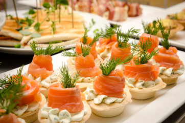 Tartlets with cream cheese and salmon. Catering services