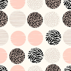 Abstract geometric seamless pattern with animal print and circles.