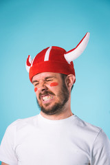 The football fan over blue