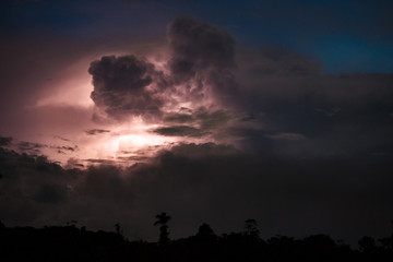 Thundercloud illuminated by lightning
