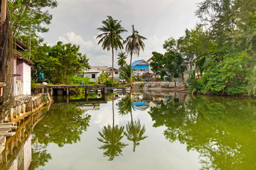 Fototapeta na wymiar Traditional house with river in Thailand